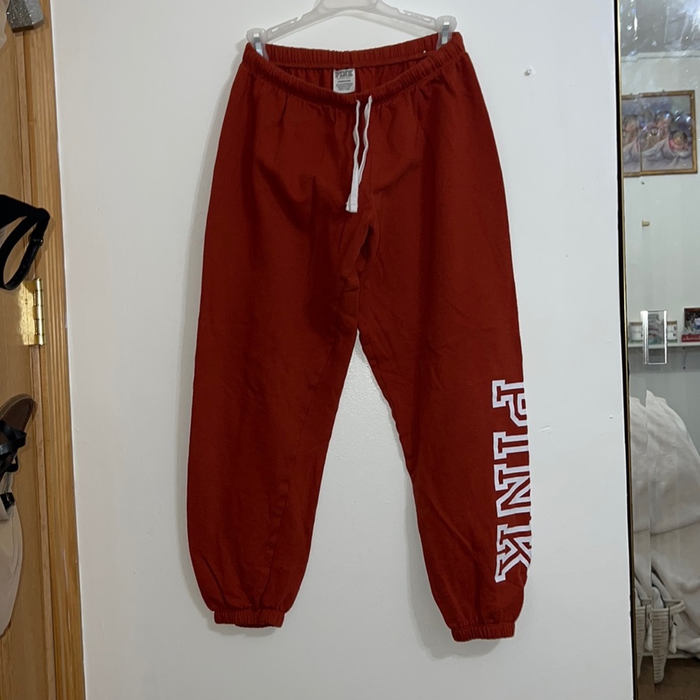 Pink joggers, size small, dark orange
